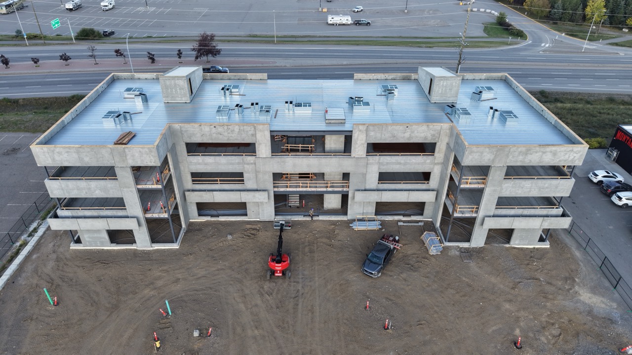 Front aerial view of RECPLACE Professional Centre with the building structure and precast panels in place
